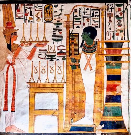 grandegyptianmuseum:  Nefertari offering linen to Ptah  Nefertari making an offering of linen to Pta