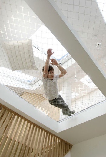 digitalramen:   Ruetemple designed this children’s playroom with an overhead hammock.