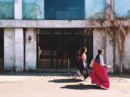 Olds walls, hanbok and shadows, Gyedong-gil.Photo by Robert Koehler of SEOUL.Get SEOUL Magazine (iOS