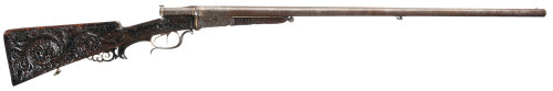 An ornate relief engraved needlefire double barrel shotgun crafted by Heinrich Barella of Magdenburg