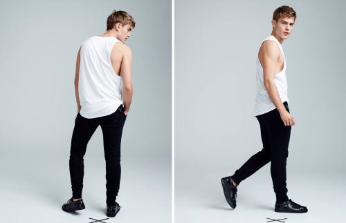 chriscruzism:Refresh Your Fit with the New Arrivals by Simons are essentials wardrobe for guys including sweatpants, long tunic shirts, also tees, side zip tee, roll-sleeve tee, tanks, complementing with white or dark sneaks. Model Bo Develius is