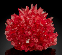 vugnasmineralblog:   Rhodochrosite on Manganite   N'Chwaning Mines, Kuruman, Kalahari manganese  fields, Northern Cape Province, South Africa  