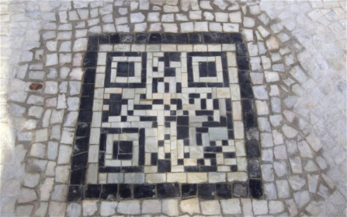 modernizing: QR Codes Embedded into Sidewalk to provide tourist information. Rio De Janeiro has embe