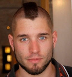 londontim:  gaymasterandslave:  Follow me at http://gaymasterandslave.tumblr.com/ for daily updates. Visit my website at http://gaymasterandslave.com/ for s&amp;M tips and gear.  Nice blue eyes; the mohawk needs sharpening up and shaving…  wow !!!