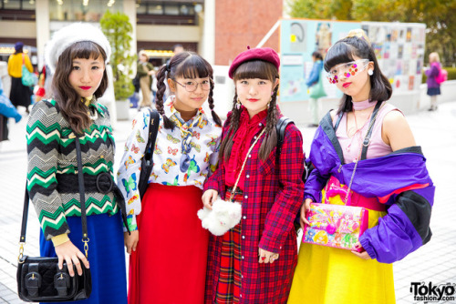 tokyo-fashion:Japanese high school students 16-year-old Riripon, 16-year-old Sponge Miyuu, 16-year-old Miori, and 15-year-old Mawonini wearing bold colors and prints on the street in Tokyo with items from Ashinaga Ojisan, San-Biki No Koneko, Thank You