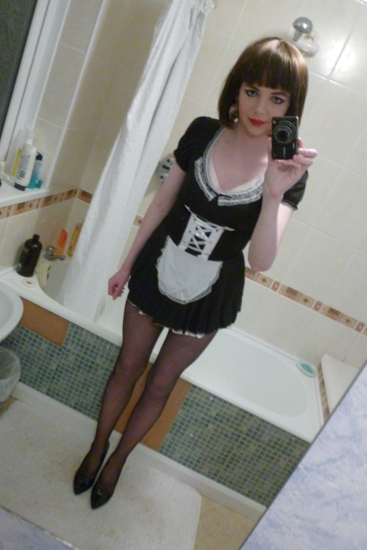 100000-fireflies:  lucy-cd:Pictures  More Maid outfit with short wig, looks amazing