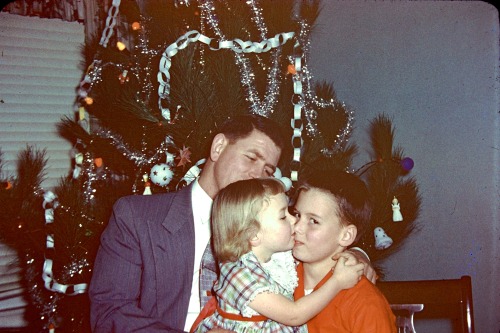 My mom, Linda, her brother Bruce, and her dad Jimmy.  Giving her brother a little smooch on Christma