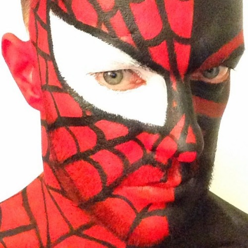 paintedguys:  One damn fine looking wrestler. The body paint is so hot! I just want to grapple him. 