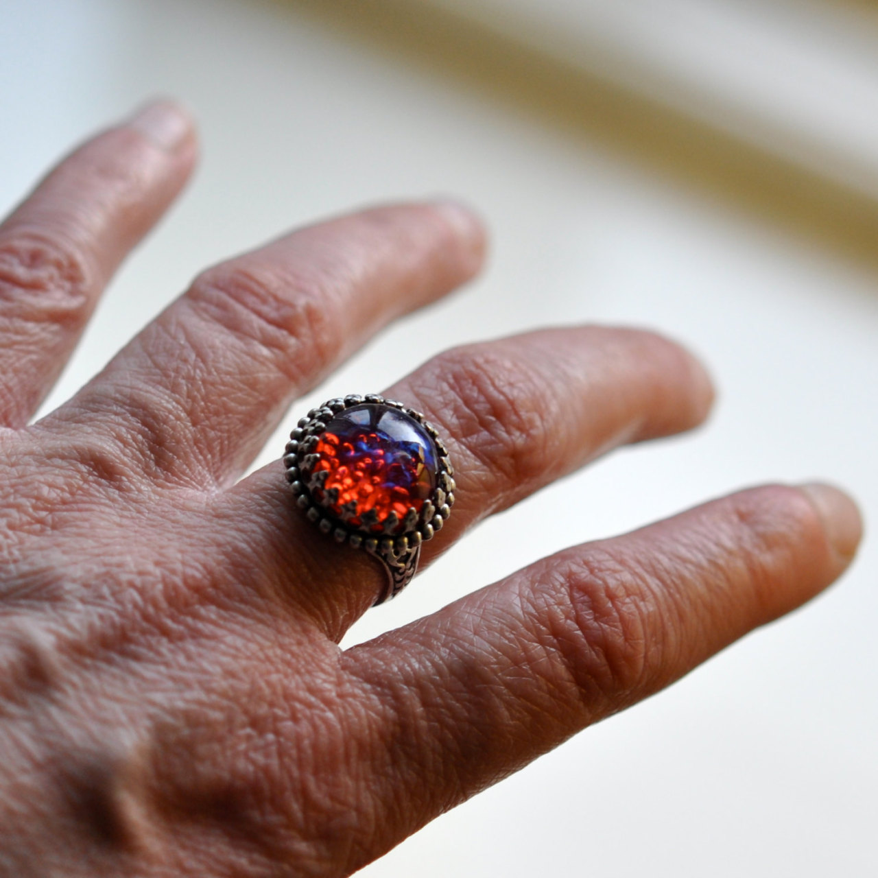 wickedclothes:  Dragons Breath Ring Dragon’s breath is a manmade gem, reddish pink
