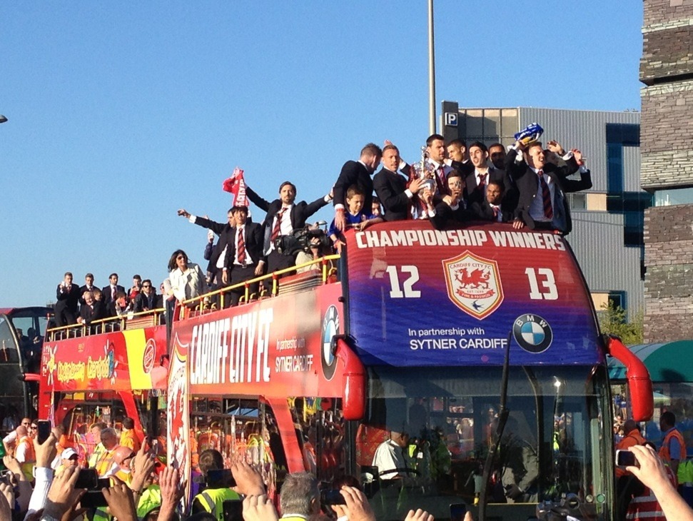 blue-madness-blue:  Cardiff City fans cheer their team on a day of sunshine celebrations