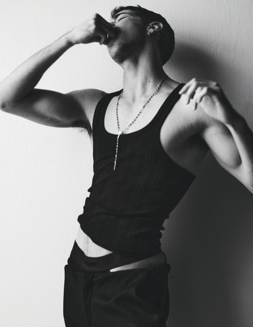 Manu Rios photographed by Giampaolo Sgura for Man About Town SS22. Manu wears tank top Dsquared and 