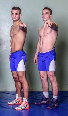 piledriveu:  2 dudes……twice the hotness…..twice the sexiness……twice the manliness…..twice the fuckin fun!!!The pic above, this tag team wants to intimidate their competition and decide to pull down their regulation singlet straps to show off