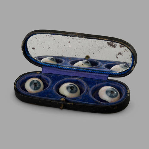 madamecuratrix:  From source: Three Glass Eyes in their Storage Box. Blown glass prosthesis. Beginni