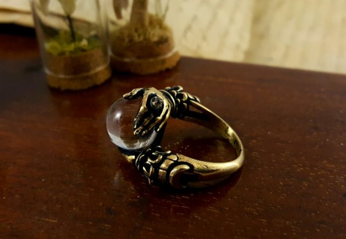 Oracle ring in antiqued brass with natural water clear quartz sphere. www.omniaoddities.com