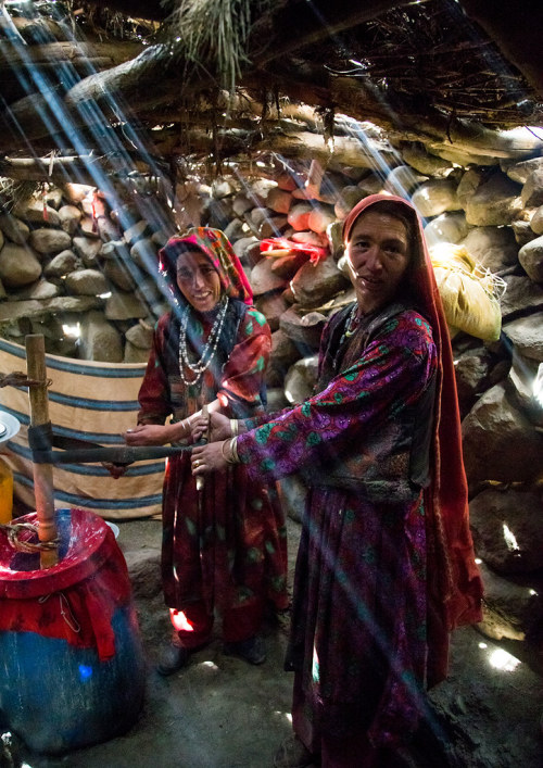  Wakhi nomad women making butter in the pamir mountains, Big pamir, Wakhan, Afghanistan. Taken on Au