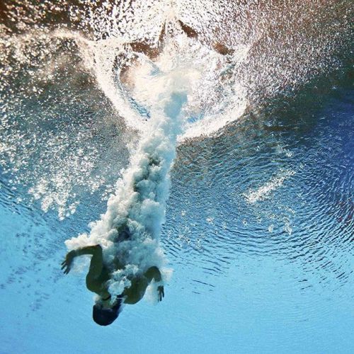 timemagazine:  Sayaka Shibusawa of Japan is seen underwater during the women’s 3m springboard 