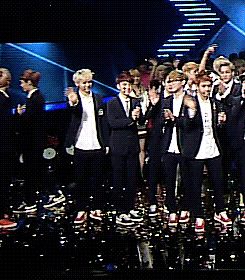 blondejongin:   kyungsoo going around with confetti on his face  