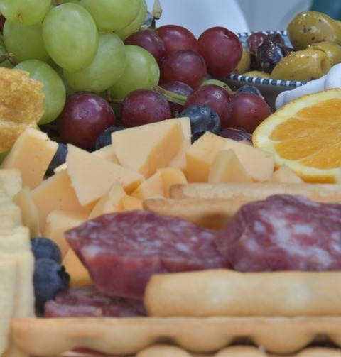 Charcuterie Recipe - Ham, Camembert, Orange Wedges, Green And Red Grapes With Olives Charcuterie