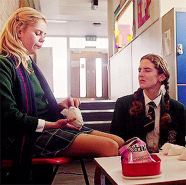 derrygirlsgifs: #erin feeding orla is cute af #but also hilarious #because she’s doing it to s