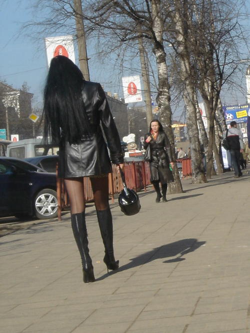 Hottie walking away in back seam pantyhose and high heeled boots