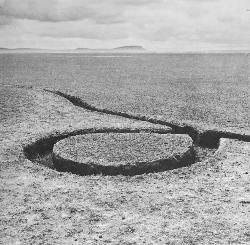 equatorjournal:  Michael Heizer. Isolated Mass/ Circumflex (#2). 1968. Excavation in playa surface. Impermanent installation at Massacre Dry Lake, Vya, Nevada.   “This was the ninth and last of a series of Nevada Depressions that Heizer carved out of