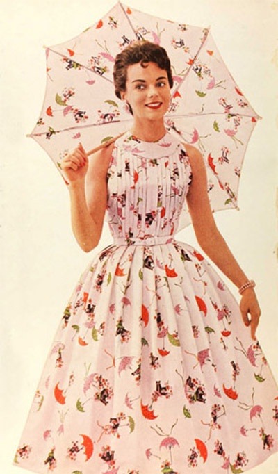 theniftyfifties:  Model wearing a matching dress and umbrella, 1955. 