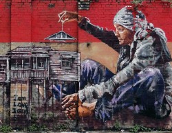 crossconnectmag:  Fintan Magee is an Australian street artist known for his murals throughout Queensland and later in New South Wales. Magee grew up in Queensland and gained a reputation as a graffiti artist before obtaining a Fine Arts degree and moving