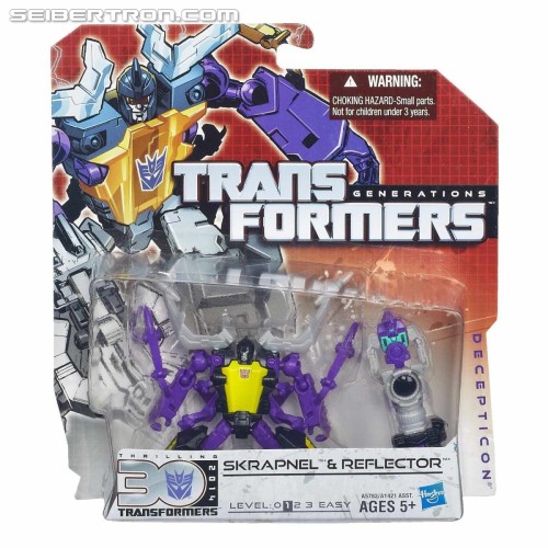 aeonmagnus:  Transformers: Generations Cosmos with Payload, Skrapnel with Reflector. 