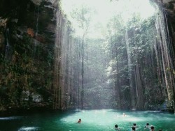 ashley-gold:  still kind of in disbelief that I actually took this picture. The sinkhole’s water was 150 feet deep and had a ledge that you could dive off of from halfway up. Probably the best experience of my life.