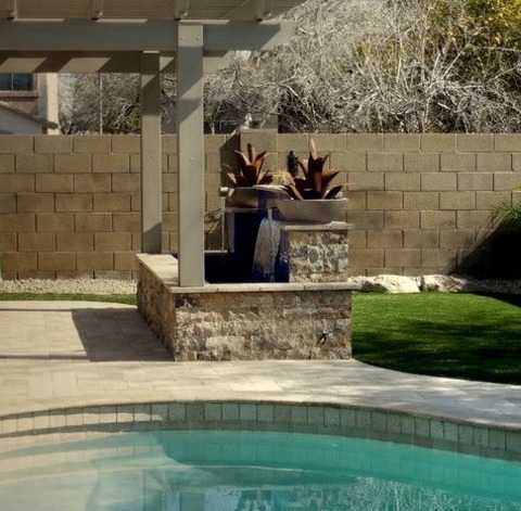 Pool Above Ground In PhoenixPool - Mid-sized Contemporary Backyard Stone And Custom-shaped Aboveground