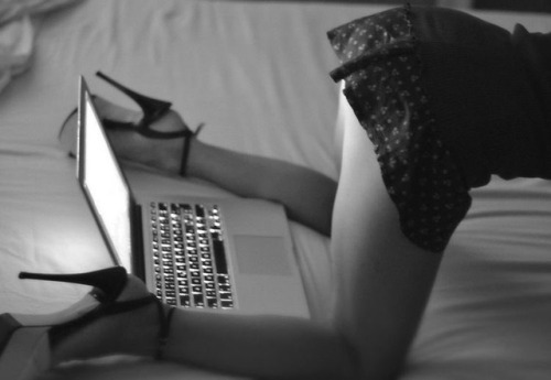 art-of-domination:  She was traveling on business that week so they would video chat each night she got back to the hotel room.  One night when she was back, he could see the hint of her long legs in view.  He felt his cock stirring for her.   “I want