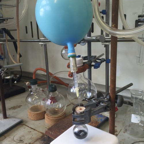 Carrying out a small scale hydrogenation reaction using Pd/C catalyst, and H2 gas (which is in the b