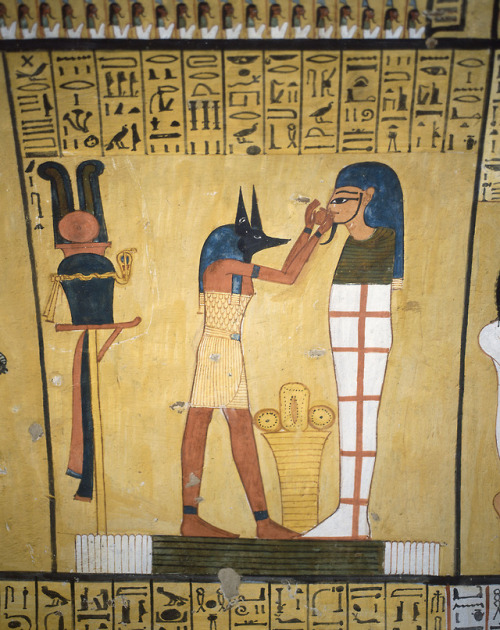 Giving of the heart ceremonyA priest wearing the mask of Anubis, god of mummification performing the