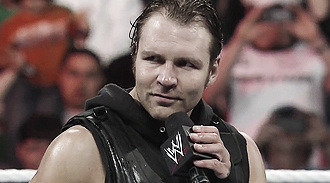 tablesladderschairs:  Dean Ambrose + smiling.  