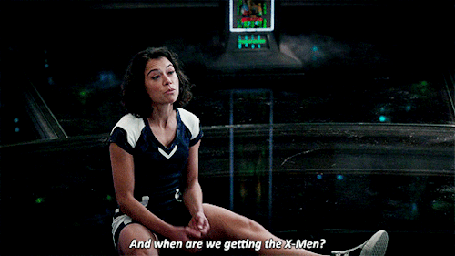 Tatiana Maslany as Jennifer Walters, asking "And when are we getting the X-Men?" and giving the camera a wink and a thumbs up