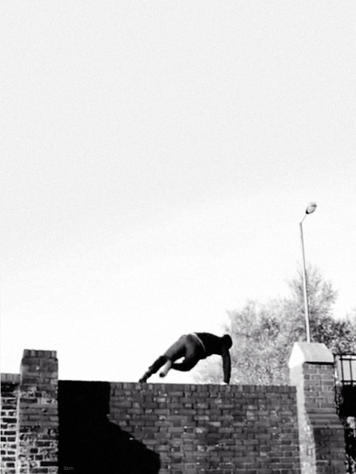 black trackpants and a hoodie. jumping a wall like a hooligan?so did someone turn my dream into a vi