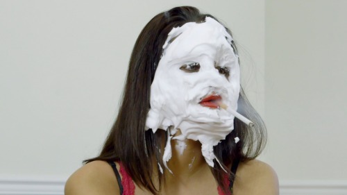 “Messy Smoker Test” is now available at www.seductivestudios.comIn this wet and messy video, Nicole prepares for her “Messy Smoker’ Series by practicing with the shaving cream all over her face, red lipstick and smoking while looking into