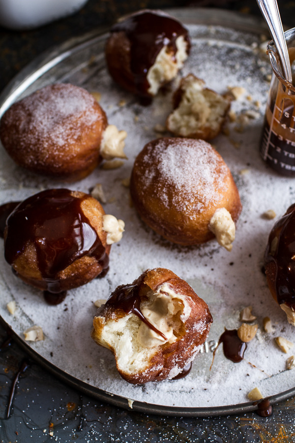 sweetoothgirl: Peanut Butter Cheesecake Doughnuts with Salted Chocolate Bourbon Caramel