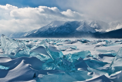 nubbsgalore:  russia’s lake baikal - the world’s oldest, largest and deepest freshwater lake - freezes over for half the year, creating clear, turquoise shards of ice. (photos x, x x, x, x, x)  