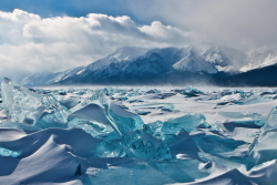 nubbsgalore:  russia’s lake baikal - the world’s oldest, largest and deepest freshwater lake - freezes over for half the year, creating clear, turquoise shards of ice. (photos x, x x, x, x, x) 