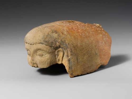met-greekroman-art:Terracotta antefix (roof tile) with female head via Greek and Roman ArtMedium: Te