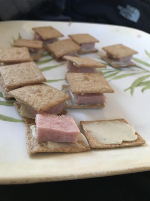 Wheat thins with spam and garlic herbs cheese spread for lunch. Oh and drinking the last bit of swee
