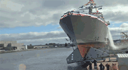 blazepress:  A navy ship being launched.