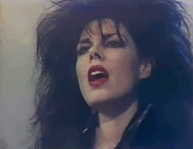 duskofhallows:  Patricia Morrison performing with The Sisters of Mercy, 1987.