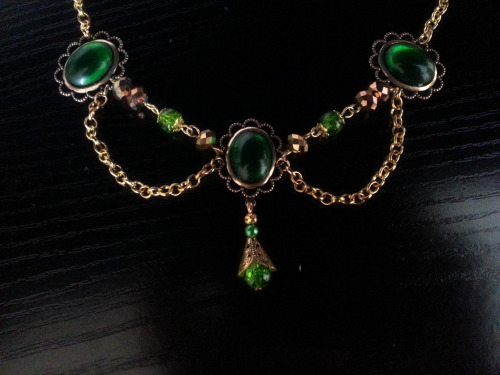 elvendesigns:  Gold tudor style necklace with amethyst stone settings also shown with bottle green stone settings and a ruby stone variation in and faceted blue glass in silver plate. 