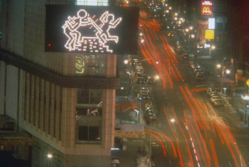 twixnmix: Keith Haring’s in front the Spectacolor Billboard showcasing his signature Radiant Baby in