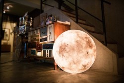 parliamentrook:  archiemcphee:  Hold the moon in the palm of your hand, give it a great big hug, or let it illuminate your room with Luna, an enchanting spherical lamp designed by Taipei-based Acorn Studio. Originally created for use on concert stages