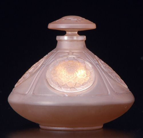 R. LALIQUE Perfume bottle, “Quatre Soleils,” clear and frosted with sepia patina, 1912li