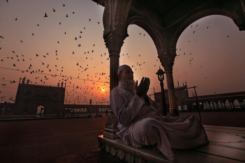 Talking to Allah During Sunrise From the Collection: Photos of Male Muslims Making Dua