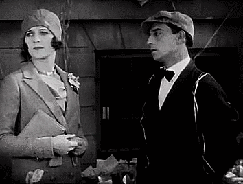 Buster Keaton prepares to take a tintype of Marceline Day in The Cameraman (1928)